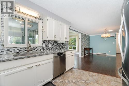Kitchen - SS Appliances - 112 Tecumseth Pines Drive, New Tecumseth, ON - Indoor Photo Showing Kitchen