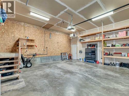 122 Redcliff Way Sw, Redcliff, AB - Indoor Photo Showing Garage