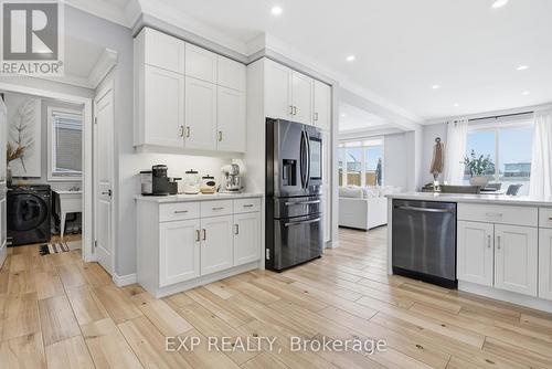 31 Miranda Path, Woolwich, ON - Indoor Photo Showing Kitchen With Upgraded Kitchen