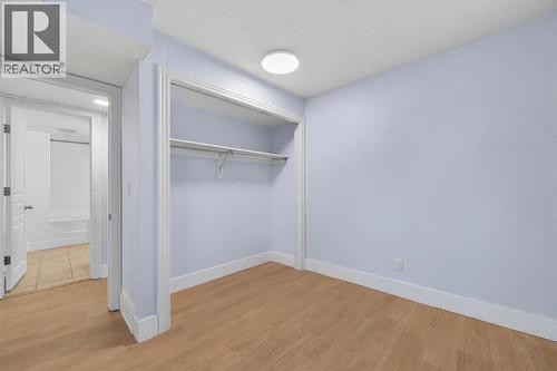 211, 25 Glamis Green Sw, Calgary, AB - Indoor Photo Showing Other Room