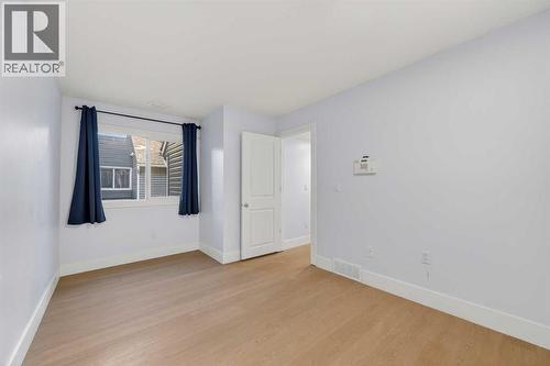 211, 25 Glamis Green Sw, Calgary, AB - Indoor Photo Showing Other Room
