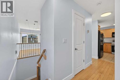 211, 25 Glamis Green Sw, Calgary, AB - Indoor Photo Showing Other Room