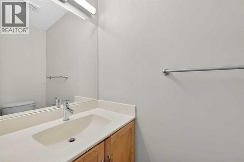 211, 25 Glamis Green Sw, Calgary, AB - Indoor Photo Showing Bathroom