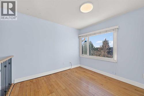 211, 25 Glamis Green Sw, Calgary, AB - Indoor Photo Showing Other Room