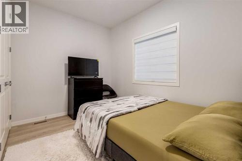 29 Marmot Passage Nw, Calgary, AB - Indoor Photo Showing Bedroom