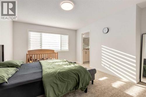 29 Marmot Passage Nw, Calgary, AB - Indoor Photo Showing Bedroom