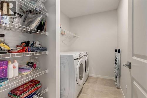 29 Marmot Passage Nw, Calgary, AB - Indoor Photo Showing Laundry Room