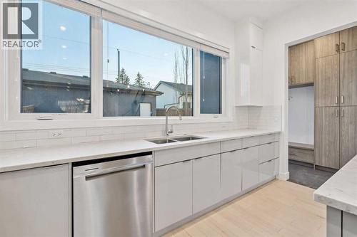 2409 28 Avenue Sw, Calgary, AB - Indoor Photo Showing Kitchen With Double Sink
