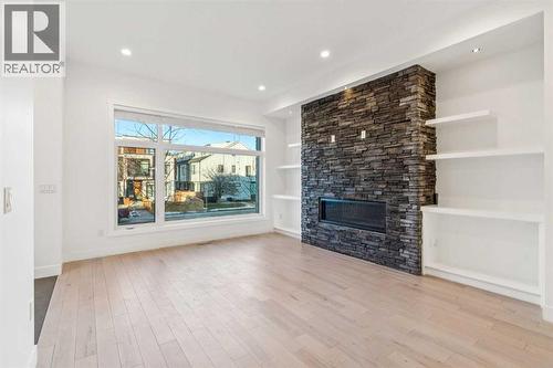 2409 28 Avenue Sw, Calgary, AB - Indoor Photo Showing Living Room With Fireplace