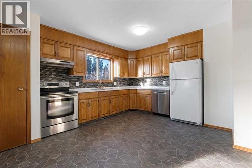 27 Tressa Street, Swan Hills, AB - Indoor Photo Showing Kitchen With Double Sink