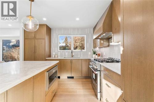 1012 70 Avenue Sw, Calgary, AB - Indoor Photo Showing Kitchen With Upgraded Kitchen