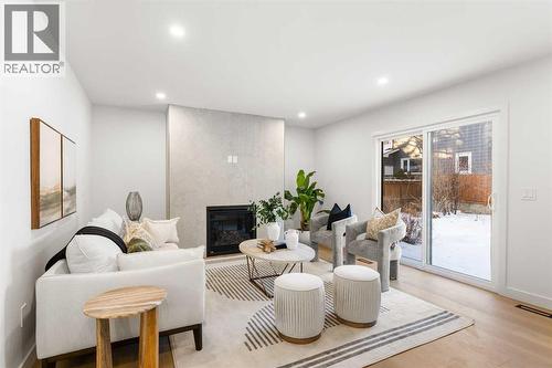 1012 70 Avenue Sw, Calgary, AB - Indoor With Fireplace