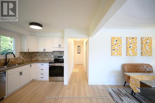 106 Beland Avenue N, Hamilton, ON - Indoor Photo Showing Kitchen With Double Sink
