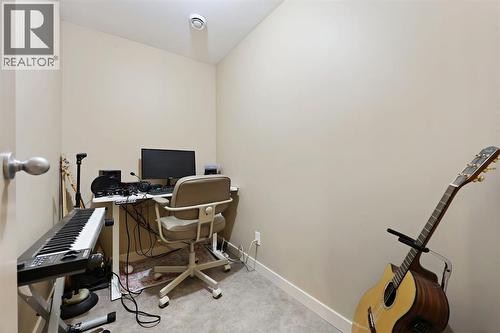 256 Lysander Place Se, Calgary, AB - Indoor Photo Showing Gym Room