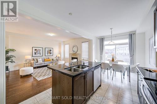 99 Chouinard Way, Aurora, ON - Indoor Photo Showing Kitchen With Double Sink With Upgraded Kitchen