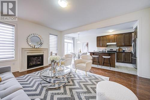 99 Chouinard Way, Aurora, ON - Indoor Photo Showing Living Room With Fireplace