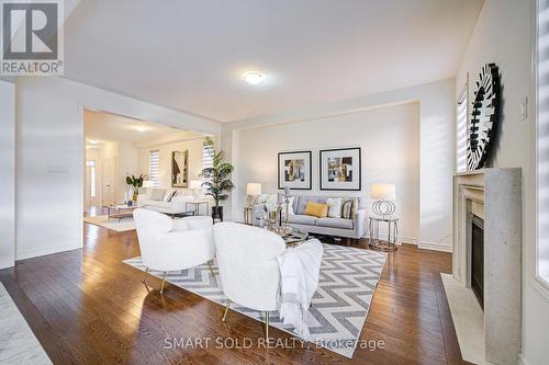 99 Chouinard Way, Aurora, ON - Indoor Photo Showing Living Room With Fireplace