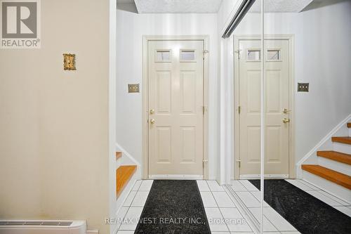 Bright Foyer With Tile Floor - 6 Hillpark Trail, Brampton, ON - Indoor Photo Showing Other Room