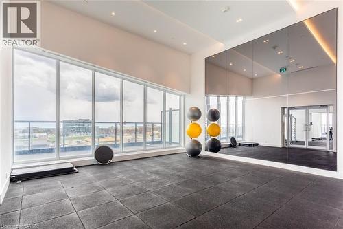 Workout area and yoga area - 297 Oak Walk Drive Unit# 2407, Oakville, ON - Indoor Photo Showing Other Room