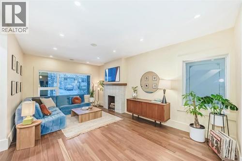 2120 18 Street Sw, Calgary, AB - Indoor Photo Showing Living Room With Fireplace
