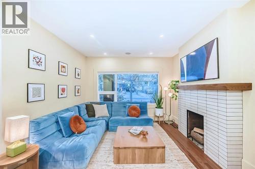 2120 18 Street Sw, Calgary, AB - Indoor Photo Showing Living Room With Fireplace
