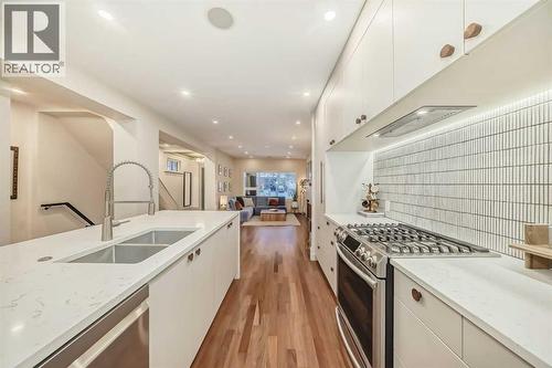 2120 18 Street Sw, Calgary, AB - Indoor Photo Showing Kitchen With Double Sink With Upgraded Kitchen