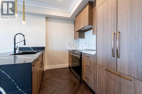 414, 370 Dieppe Drive Sw, Calgary, AB - Indoor Photo Showing Kitchen With Upgraded Kitchen