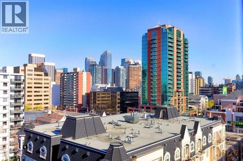 703, 930 16 Avenue Sw, Calgary, AB - Outdoor With Facade