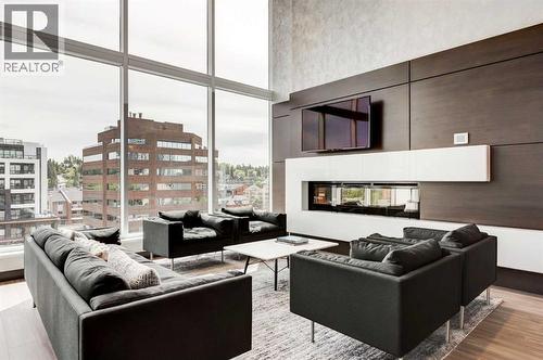 703, 930 16 Avenue Sw, Calgary, AB - Indoor With Fireplace