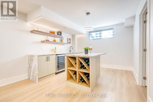 Basement Wet Bar w/leather textured quartzite - 519 Third Line, Oakville, ON - Indoor