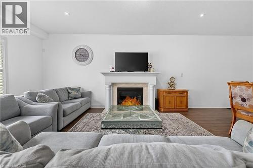 63 Chamomile Drive, Hamilton, ON - Indoor Photo Showing Living Room With Fireplace