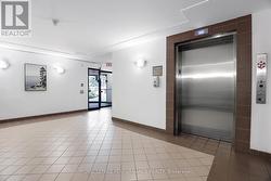 Front door to building and elevator - 