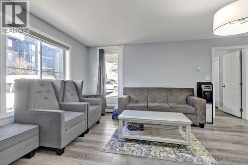 117, 7130 80 Avenue Ne, Calgary, AB - Indoor Photo Showing Living Room