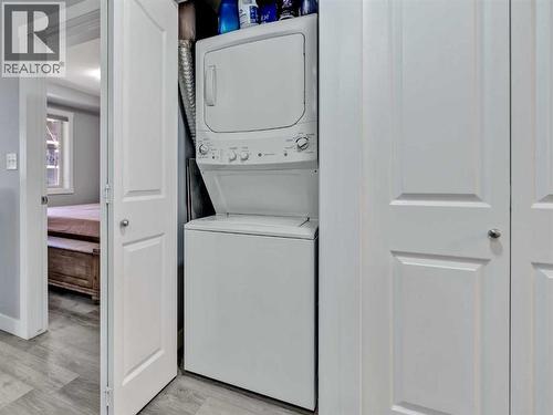 117, 7130 80 Avenue Ne, Calgary, AB - Indoor Photo Showing Laundry Room