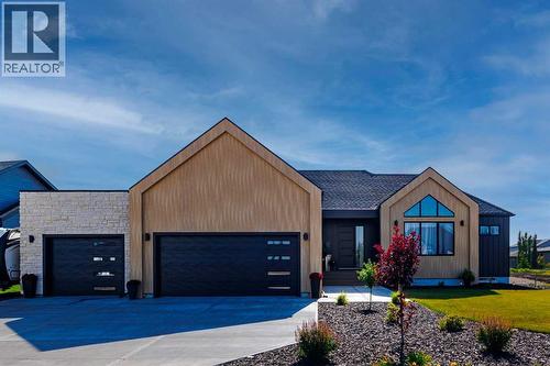 19 Monterra Way, Rural Rocky View County, AB - Outdoor With Facade