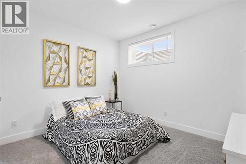 19 Monterra Way, Rural Rocky View County, AB - Indoor Photo Showing Bedroom