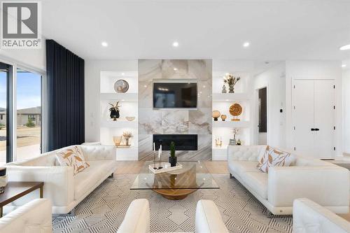 19 Monterra Way, Rural Rocky View County, AB - Indoor Photo Showing Living Room With Fireplace