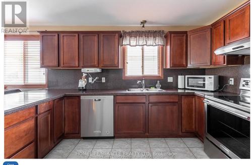 655 Alpenrose Court, Windsor, ON - Indoor Photo Showing Kitchen With Double Sink