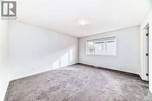 140 Carringham Road Nw, Calgary, AB - Indoor Photo Showing Other Room