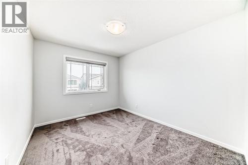 140 Carringham Road Nw, Calgary, AB - Indoor Photo Showing Other Room