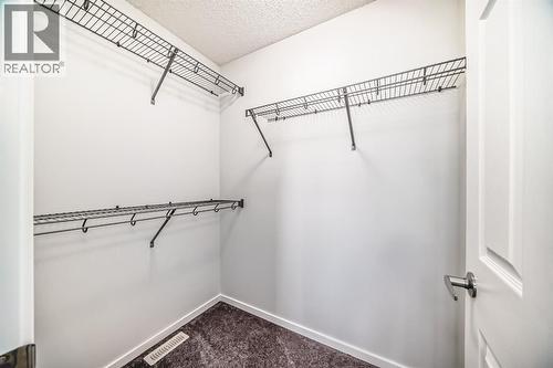 140 Carringham Road Nw, Calgary, AB - Indoor With Storage