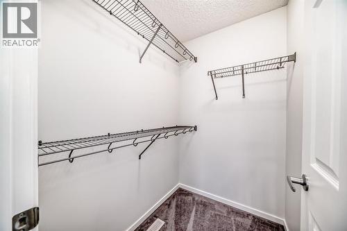 140 Carringham Road Nw, Calgary, AB - Indoor With Storage
