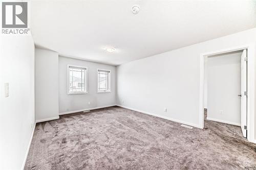 140 Carringham Road Nw, Calgary, AB - Indoor Photo Showing Other Room