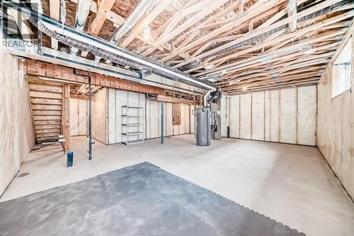 140 Carringham Road Nw, Calgary, AB - Indoor Photo Showing Basement