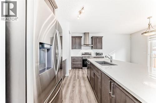140 Carringham Road Nw, Calgary, AB - Indoor Photo Showing Kitchen With Double Sink With Upgraded Kitchen