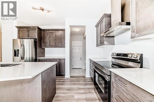 140 Carringham Road Nw, Calgary, AB - Indoor Photo Showing Kitchen With Double Sink With Upgraded Kitchen