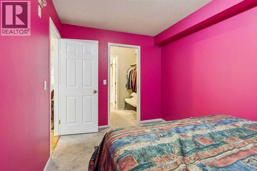 105, 15320 Bannister Road Se, Calgary, AB - Indoor Photo Showing Bedroom
