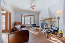Salon - 330 Av. Edison, Saint-Lambert, QC  - Indoor Photo Showing Living Room With Fireplace 