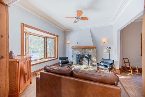 Salon - 330 Av. Edison, Saint-Lambert, QC - Indoor Photo Showing Living Room With Fireplace