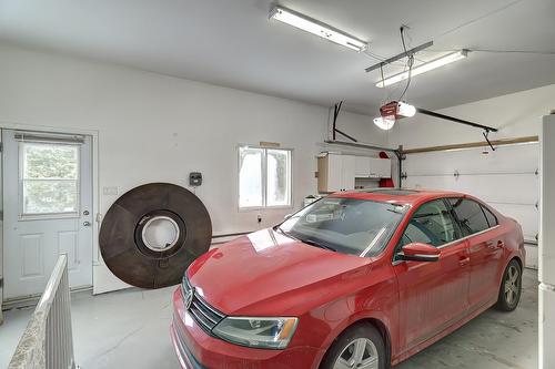Garage - 484 Rue De La Pommeraie, Rosemère, QC - Indoor Photo Showing Garage